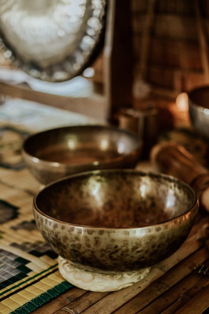 Close-up of Tibetan singing bowls, perfect for meditation and sound healing.
